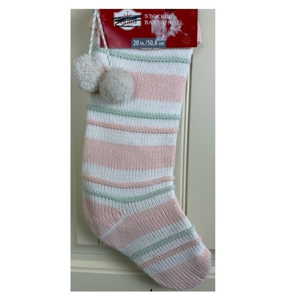 Festive pink and white striped Christmas stocking, knitted, lined with pom-poms.